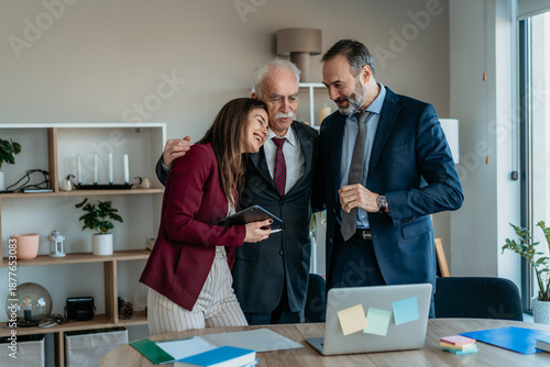 Senior Businessman with Son and Daughter in Modern Office – Family Business Transition
