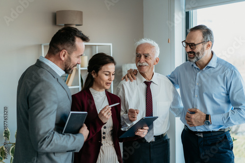 Multi-Generational Family Business Team Working Together in Modern Office – Warm Atmosphere