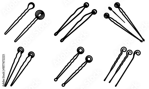 Set of black hairpins with various decorative ends on white background hair accessories beauty