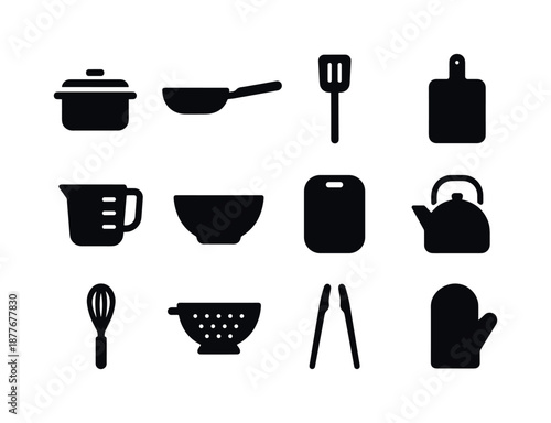Kitchenware Icon Set. Kitchenware. Solid icon set of kitchenware: saucepan, frying pan, spatula, ladle, measuring cup, mixing bowl, cutting board, kettle,