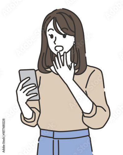 スマートフォンを見て驚いた若い女性