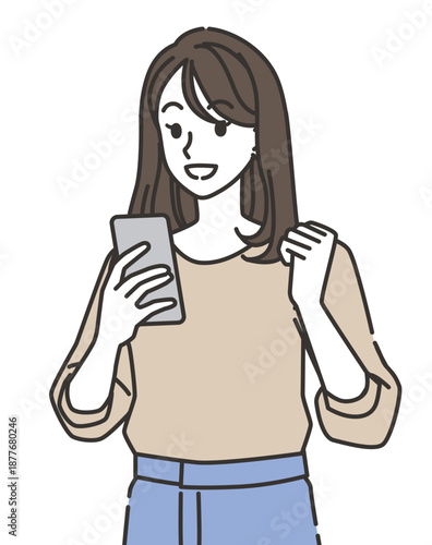 メッセージを見て喜ぶ若い女性