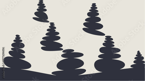 Stacked stones creating tranquil, balanced cairns against a neutral background