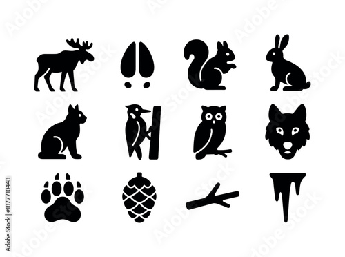 Winter Forest Icons. Winter forest wildlife. Solid icon set of winter forest wildlife: moose, deer tracks, squirrel, hare, lynx, woodpecker, owl perched, wolf