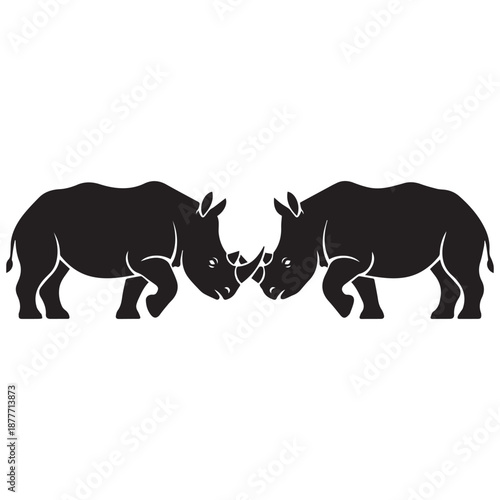 Two black rhinos facing each other in aggressive stance