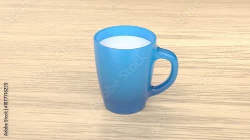 Blue ceramic mug with milk on wooden table