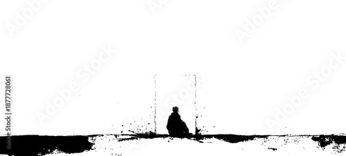 Silhouette of a lone figure seated in minimalistic black and white abstract setting