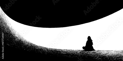 Silhouette of woman sitting in stark black and white landscape