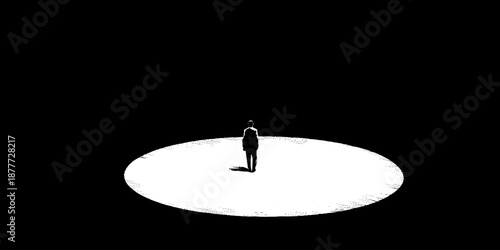 Silhouette of a person standing in a spotlight circle on black background