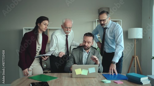 Multi-Generational Business Team Concerned in Modern Office – Business Problem Concept