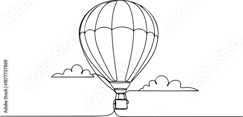 Hot air balloon flying above the clouds