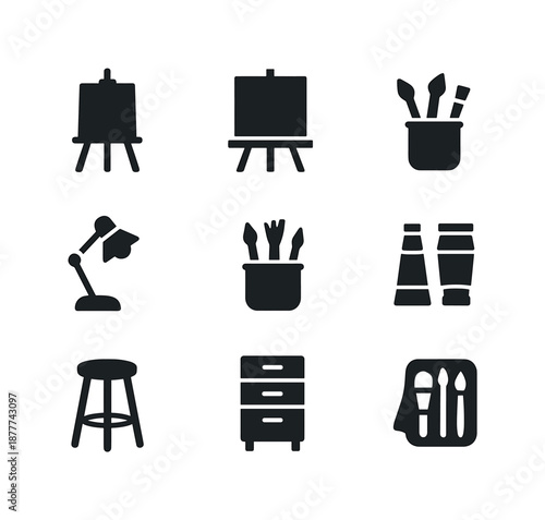 Studio Icon Set. Studio setup. Solid icon set of studio setup: easel, canvas, work table, desk lamp, brush jar, paint tubes, stool, storage drawers,