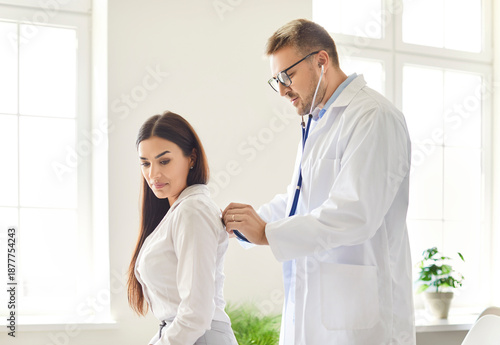 Canvas Print Doctor stethoscope listening to heart, lungs, female health care, doctor clinic