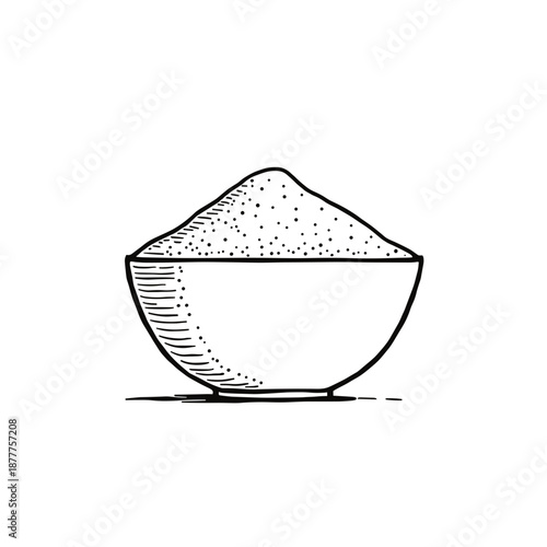 Bowl of sugar with a heap of granulated texture  