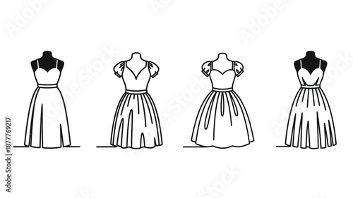 Four vintage style dresses displayed on dress forms in a linear arrangement