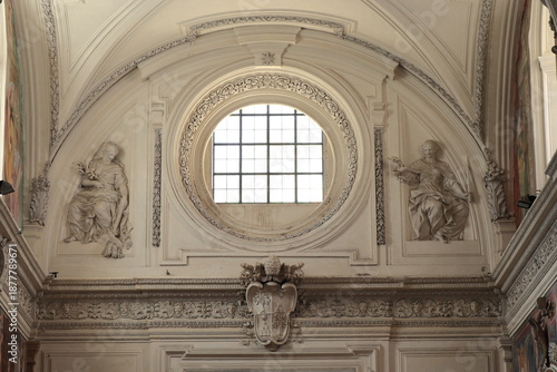 Santa Maria della Pace Church Interior Detail with Window and Sculpted Decoration in Rome, Italy