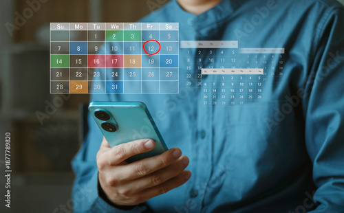 Schedule planning, reminders, time management, mobile productivity, and smart personal organization . Person using smartphone with digital calendar overlay, highlighting an important date.