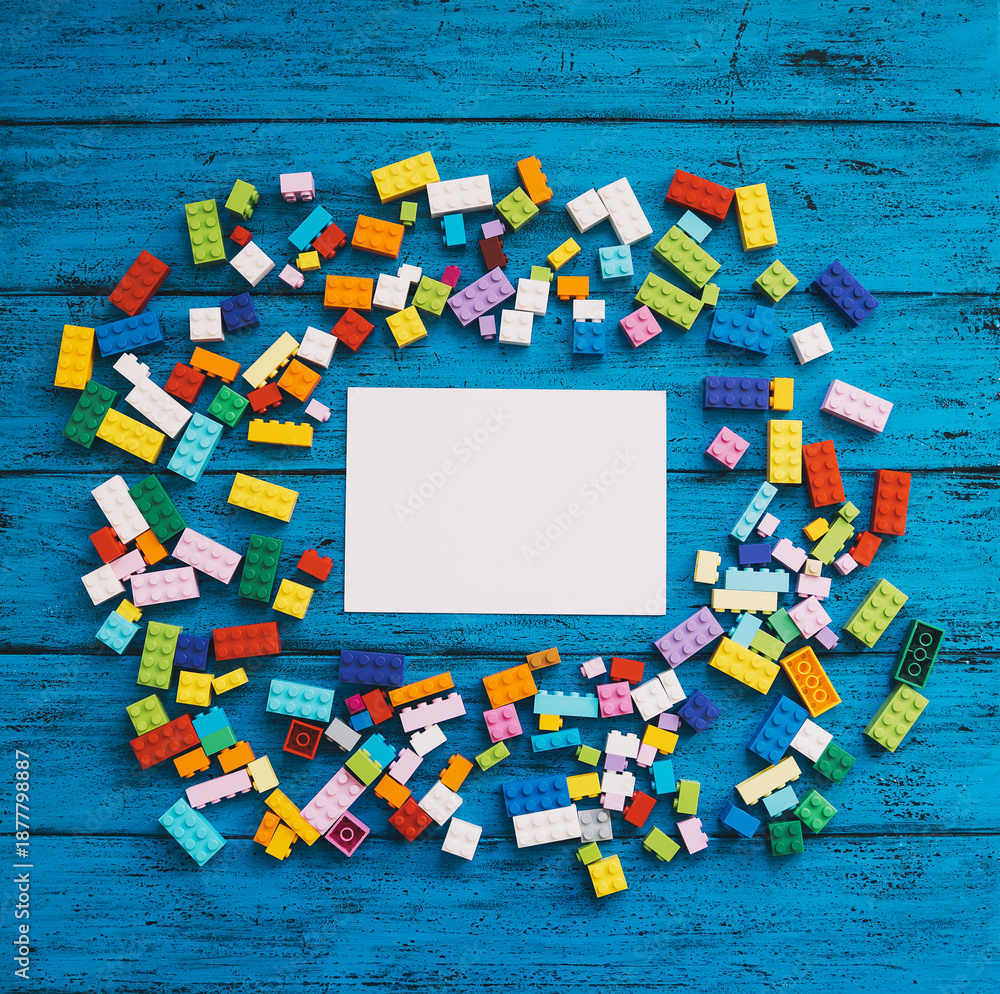 Naklejka premium Сolourful creative children's background with colored toy bricks