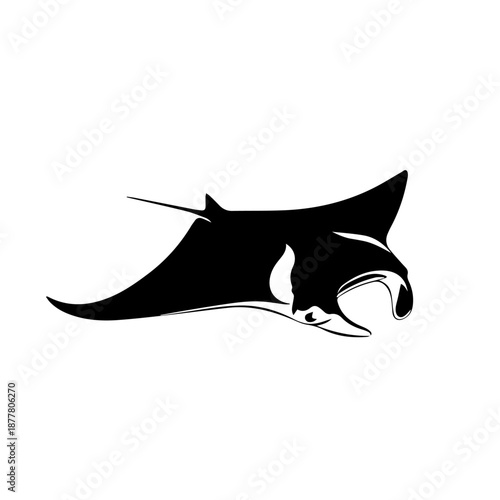 A striking black and white silhouette of a manta ray gracefully swimming through the water.