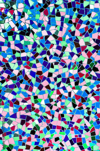 Colorful mosaic tile surface made of broken ceramic pieces forming abstract decorative pattern with vibrant colors artistic texture and playful creative mood