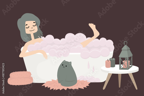 Girl relaxes in a bubble bath  with cat