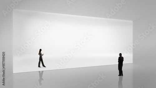 Foto Minimalist artwork with two people facing large white wall