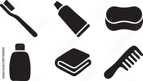 Black silhouette of toothbrush toothpaste bottle sponge folded towel and comb tube