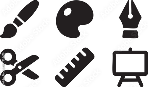 Collection of black and craft tool including paintbrush palette scissors ruler easel and pen nib