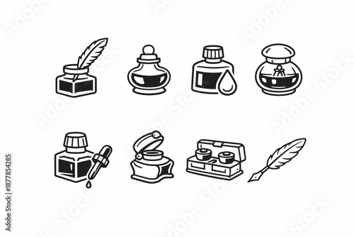 Collection of vintage ink bottles and quill pens in black and white design