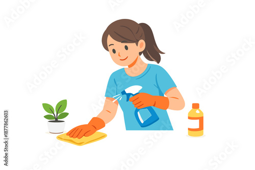 Woman cleaning a surface with spray bottle and cloth