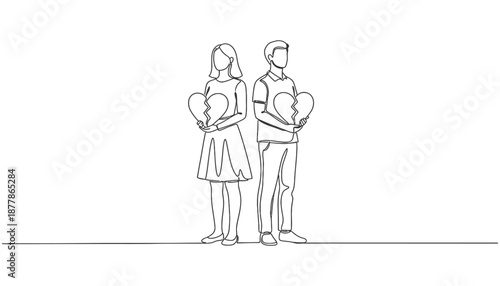 Two people holding broken hearts. Scene is sad and heartbroken. The idea behind the image is to convey the pain and sorrow of a broken relationship