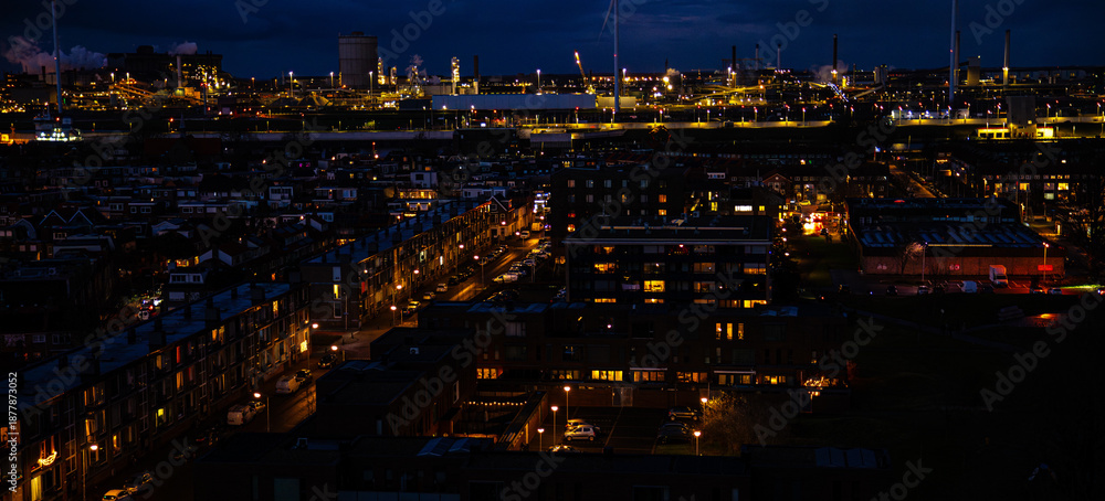 Naklejka premium Ijmuiden Netherlands aerial view at night. Old dancing houses, canals, river channel and ships, canals with bridges, old european city landscape from above.