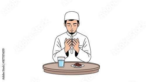 Muslim man praying before breaking fast with dates and water