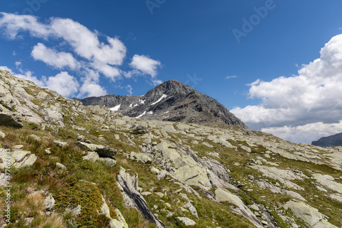 Panoramic mountain view of the Mont-Cenis Massif ,Savoie, French Alps, featuring rugged peaks, alpine meadows, and natural high-altitude scenery.