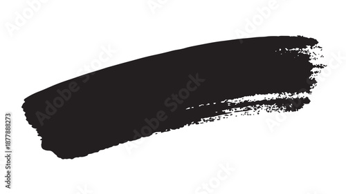A black brush stroke is applied to a clean surface from left to right with visible texture and edge detail