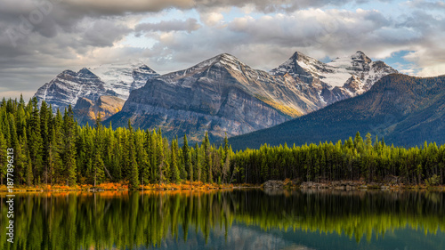 Golden evening autumn light reflection at Herbert Lake on the Icefields Parkway - Banff National Park	