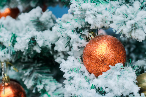 Christmas ornaments on the tree.