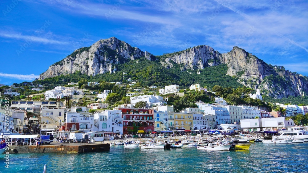 Fototapeta premium Capri Italy. A View of the ferry docks and the town of Marina Grande on the picturesque island of Capri in the Tyrrhenian Sea, Italy