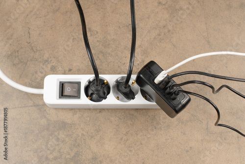 Εκτύπωση καμβά Extension power outlet socket overloaded with plugs, USB adapter with charge cab