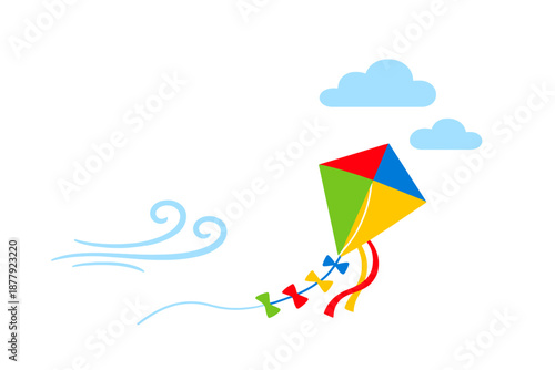 Colorful kite flying among clouds and wind
