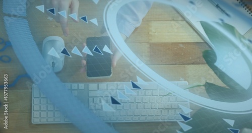 Holding adult hands with white shirt cuff tapping smartphone on wooden work desk, with keyboard