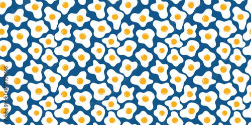 Seamless fried egg pattern on blue background for design