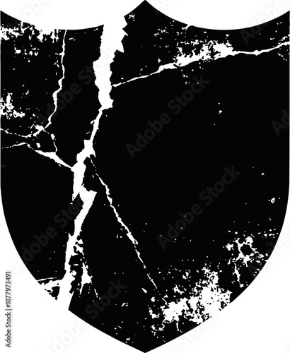 Worn cracked black shield emblem with distressed texture and damage effects
