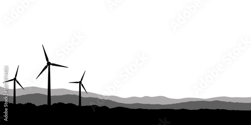 Wind turbines silhouettes across hilly landscape showing renewable energy concept. Clean scene representing sustainable power generation
