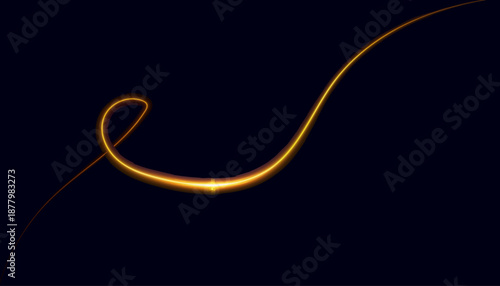 Elegant glowing golden light trail on dark background