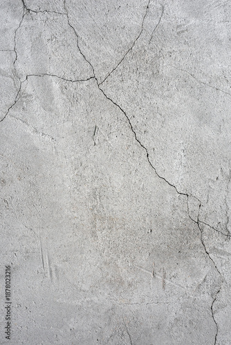 old plaster on the wall, cement, adhesive for screed. the old clay wall is crumbling. surface wall for vintage background. Wall texture, cracked plaster, grey cement floor, needs repair, restoration