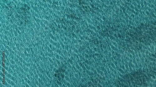 A bird's-eye view video showing the clear turquoise waters and mesmerizing wave patterns of Lake Salda.