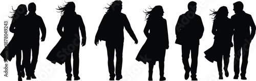 Silhouettes of Couples Walking in Coats with Windblown Hair