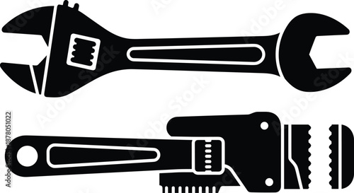 Black silhouette icons of adjustable wrench and pipe wrench for mechanical, plumbing, and repair visuals