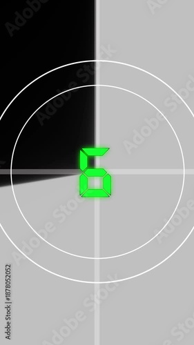 Green Digital Number 8 on a Vintage Film Countdown Leader with Concentric Circles and Grey Grid